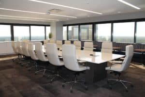 Tendered a resignation in a modern meeting room
